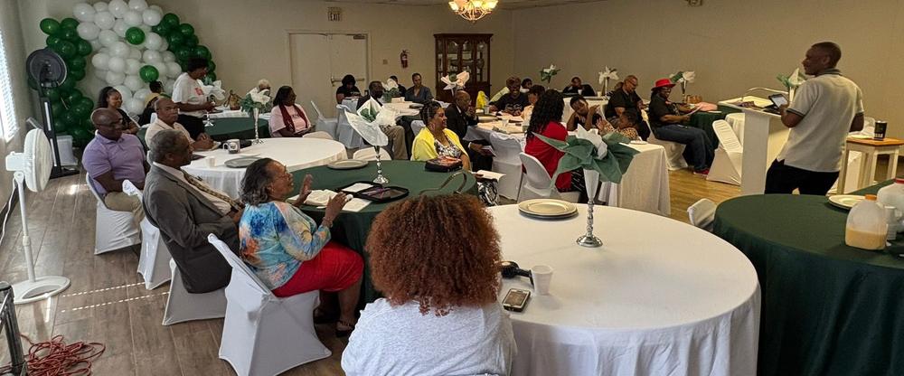 Members of Lakeview gathered around tables for Sunday School
